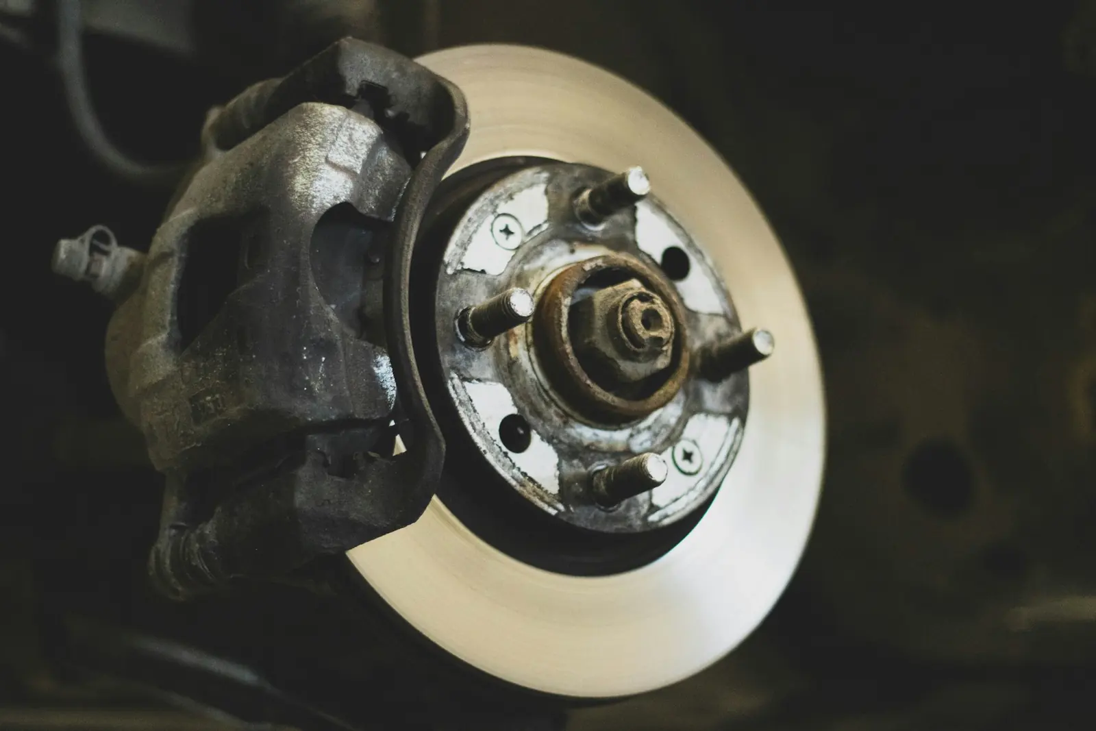 Brake rotor and caliper close-up during a brake job